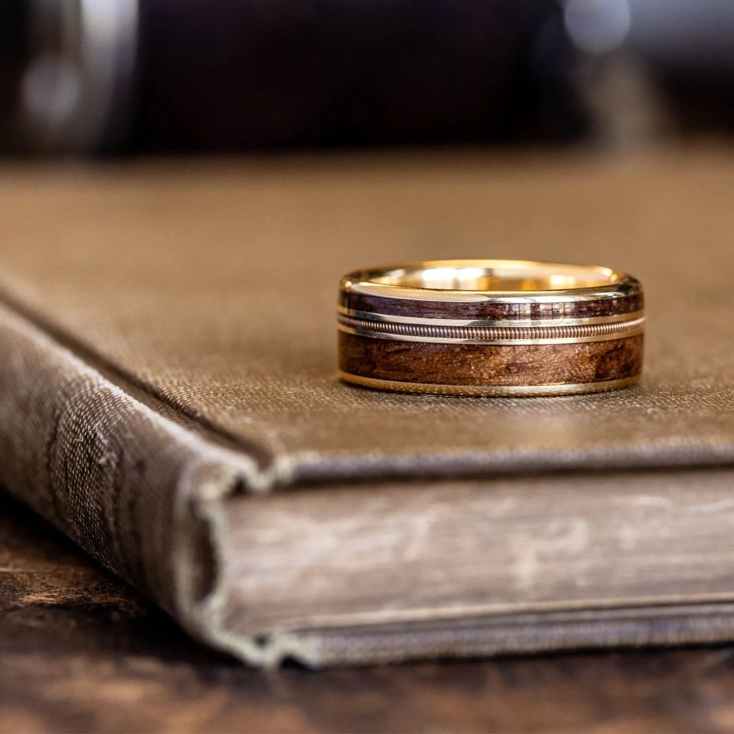 The Waylon | Men's Gold Wedding Band with Guitar String & 1903 Springfield Rifle Stock Wood