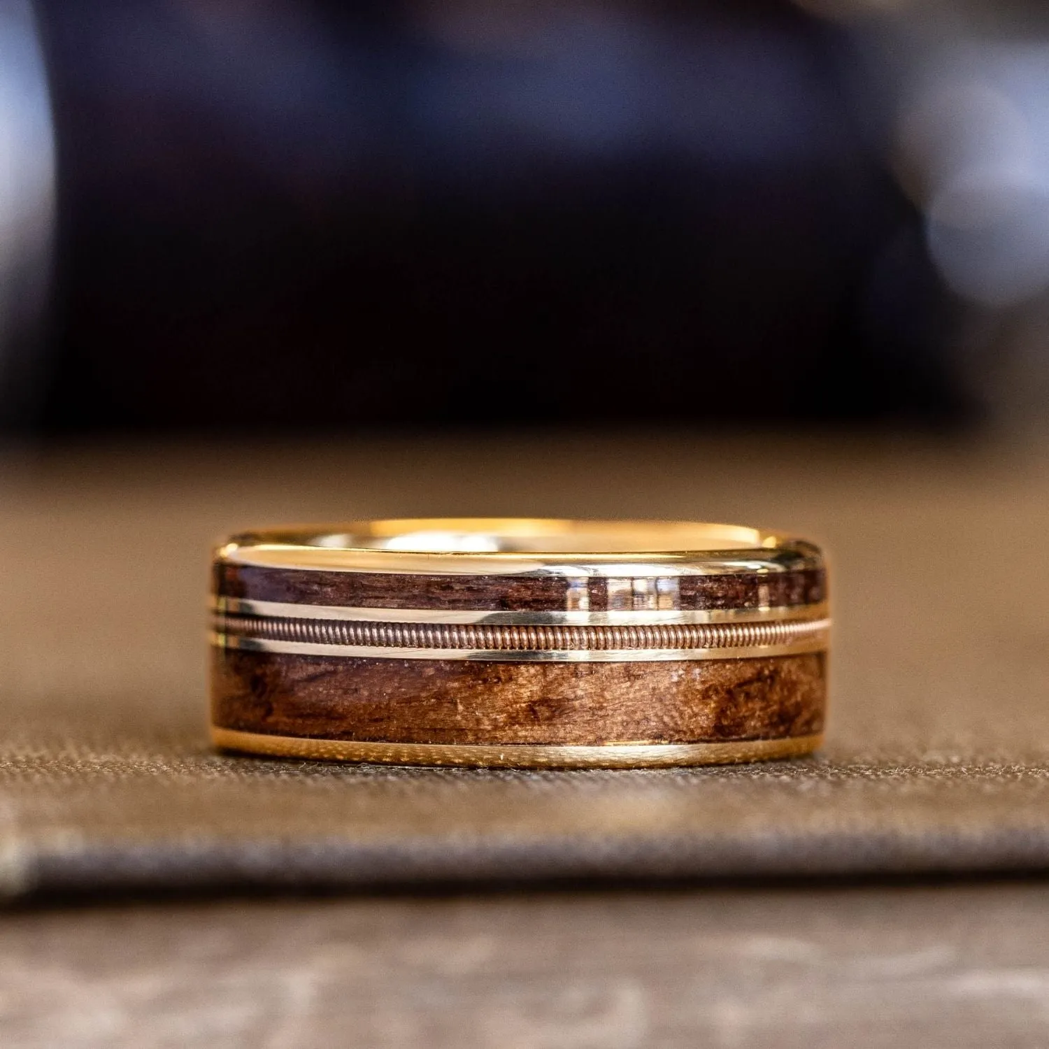 The Waylon | Men's Gold Wedding Band with Guitar String & 1903 Springfield Rifle Stock Wood